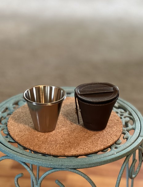 Small stainless steel cups in case - J. Peterman Co.