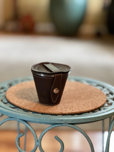 Small stainless steel cups in case - J. Peterman Co.