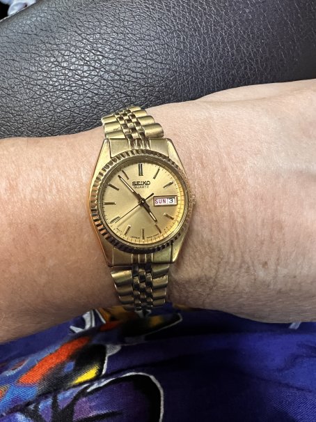 Seiko women's wristwatch with date and day